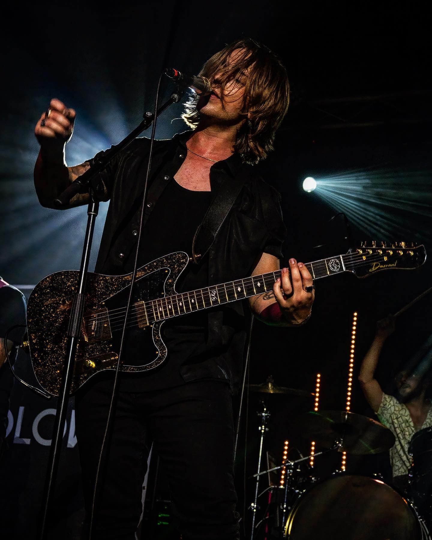 Brogan Kelby with a Durrant guitar